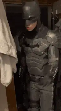 Batman suit flexing muscles