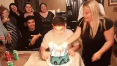 Birthday cake blown out and camera knocked over