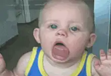 Baby sticking tongue out