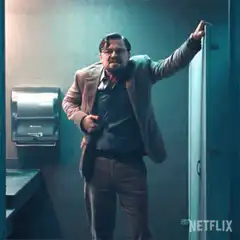 Joaquin Phoenix as Joker in bathroom