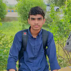 Young man in blue shirt with backpack