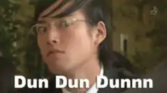 Man with glasses eyes widen Dun Dun Dunnn