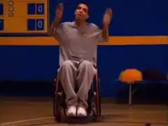 Man in wheelchair clapping