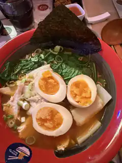 Ramen bowl with soft boiled eggs and seaweed