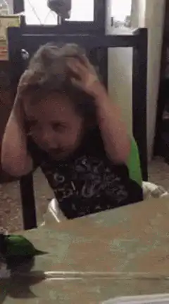 Toddler pulling hair in frustration