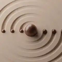 Brown spheres orbiting a central sphere
