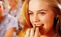 Alicia Silverstone eating chocolate