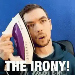 Man holding iron to face The Irony
