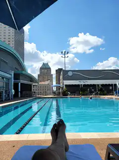 feet relaxing by pool