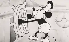 Mickey Mouse steering a ship