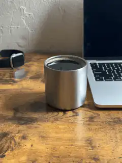 coffee cup on wooden desk