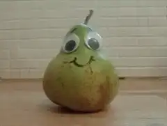pear with googly eyes turns around