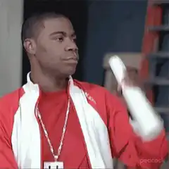 Tracy Morgan looking through a tube