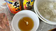 Cold soba noodles with dipping sauce and condiments