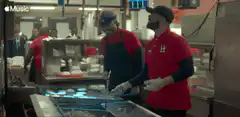 Two men working in a kitchen