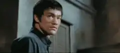 Bruce Lee kicks man into boxes
