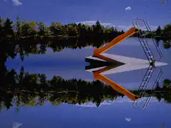 Orange slide in lake with scanlines