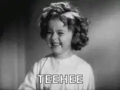Shy little girl giggling teehee