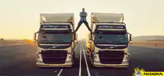 Man bridges two trucks