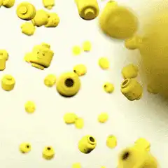 Yellow Lego pieces falling