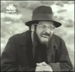 Man in hat laughing hysterically