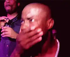 Man reacts with disgust to armpit smell