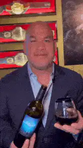 Dean Norris holding Blue Cora wine
