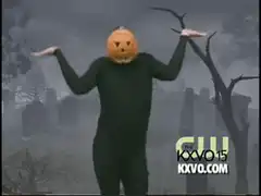 Pumpkin head shrugging in graveyard