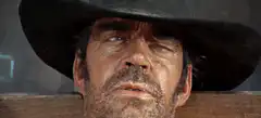 Man in cowboy hat winking