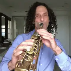 Kenny G playing saxophone