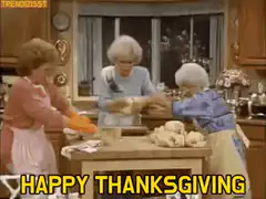 Three women kneading dough in kitchen