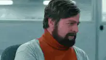 Ron Swanson nodding and smiling