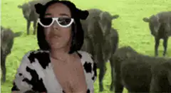 Woman in cow outfit with sunglasses