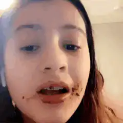 Girl with chocolate on face