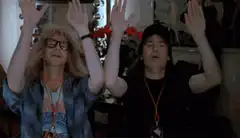 Bill and Ted raise hands and bow