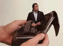 Tiny man in a wallet