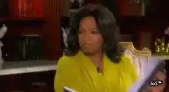 Oprah Winfrey reading a book