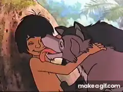Mowgli hugging wolves