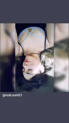 woman lying down in strappy top