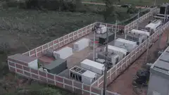 Aerial view of a fenced-in electrical substation