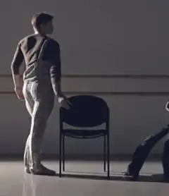 Ballet dancer spins chair