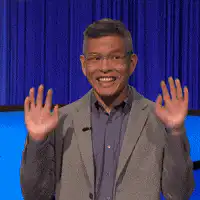 Jeff Goldblum waving hands excitedly
