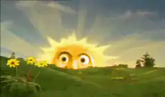 Sun character rising over green hills