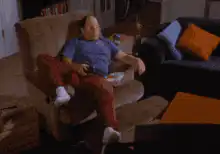 Man reveals hidden snack compartment in recliner