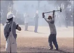 Man hits another man with a hammer