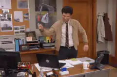 Michael Scott hits computer with hammer