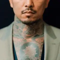 Man with neck tattoos