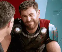 Thor smirking at Loki