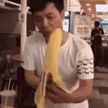 Man peels giant banana