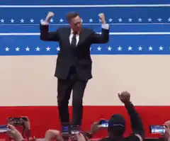 Elon Musk excited at podium